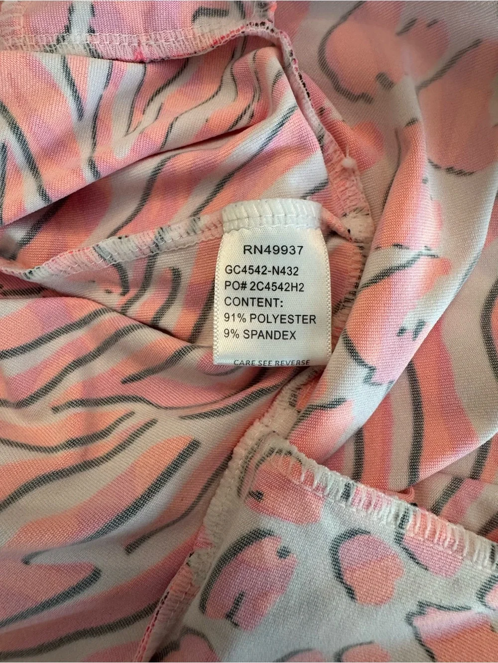 The Tail Activewear Gaia Zebra Swirl Pleated 18